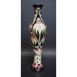 A contemporary Moorcroft Dibden Daisy pattern slender elongated baluster vase,