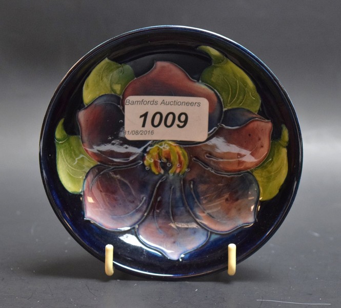 A Moorcroft pottery anemone pattern bowl, signed, Queen Mary pottery label,
