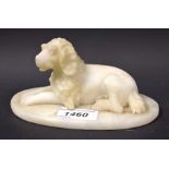 Continental School (19th century), an alabaster study, of a poodle, recumbent, oval base,