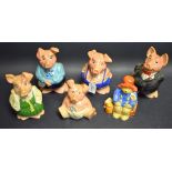 A set of five Wade Natwest piggy banks;