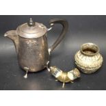 An EPNS Arts and Crafts hand hammered hot water jug; a salt and pepper stand;