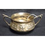 An Edwardian silver Art Nouveau two handled compressed ovoid bowl,