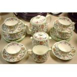 A Minton Haddon Hall pattern six setting tea service, including teapot, milk jug, sugar bowl, cups,
