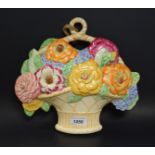 A Beswick wall plaque, in the form of a basket of colourful flowers, 28cm high, printed marks,