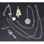 A silver locket on neckchain; brooches; etc.