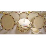 A Staffordshire dinner service for six decorated with a floral band comprising dinner plates,