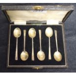 A cased set of silver coffee spoons,