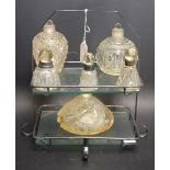 An Art Deco two tier glass and metal cake stand; a silver collared scent bottle;