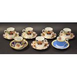 A harlequin set of seven demitasse cups and saucers including Grafton and Cauldon china