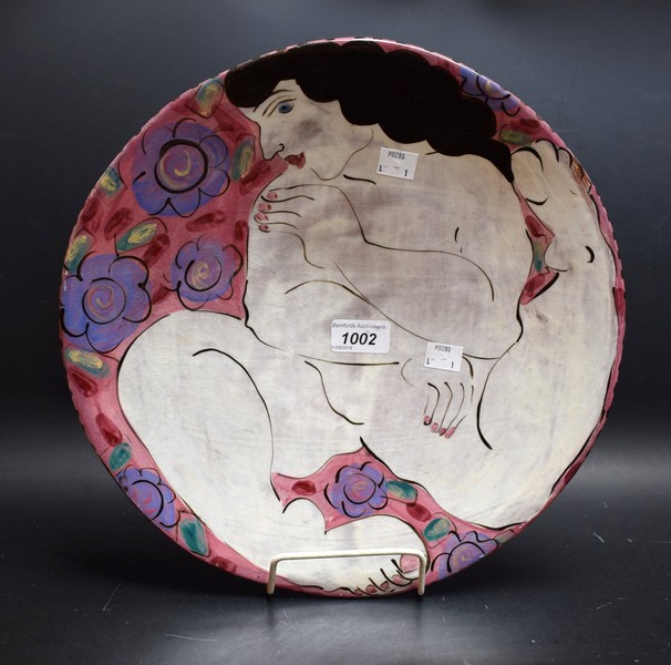 A studio Pottery charger by Karen Atherley, signed to verso, painted with Female Nude, 34.