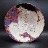 A studio Pottery charger by Karen Atherley, signed to verso, painted with Female Nude, 34.