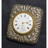 A silver cased desk top clock,