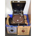 A vintage portable His Masters Voice gramophone, black case, retailed by GS Bosworth and Son,