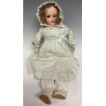 An Armand & Marseille bisque head doll, sleeping brown glass eyes,