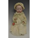 An Eisenmann & Co Einco character baby, with blue intaglio eyes, closed mouth, painted blonde hair,