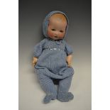 An Armand & Marseille bisque head and composition bent limb doll, sleeping blue glass eyes,