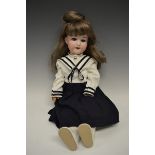 An Armand & Marseille bisque head doll, sleeping blue glass eyes,