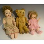 A Pedigree walking doll, open close eyes, light brown hair, original dress,