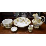 A late Victorian Staffordshire Burslem Chiswick pattern wash jug and bowl set, chamber pot,