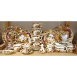 A Royal Crown Derby Old Avesbury pattern part tea service; a salt and pepper; trinket trays;