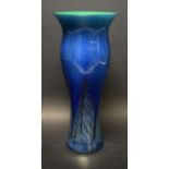 A Loetz-design iridescent vase, of slender slightly baluster form, feathered base, 26.