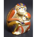 A Royal Crown Derby paperweight Monkey and baby,