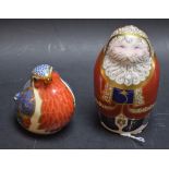 A Royal Crown Derby paperweight Santa, gold stopper; another; Robin,