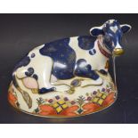 A Royal Crown Derby paperweight Friesian cow Buttercup,