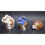 A Royal Crown Derby paperweight, Orchard Hedghog, gold stopper, boxed; another, Debenhams Squirrel,