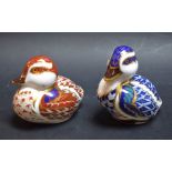 A Royal Crown Derby paperweight, Sitting Duckling, gold stopper, boxed; another, Swimming Duckling,