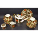 An Abbeydale Chrysanthemum pattern tea service for four comprising teapot, sucrier, cream jug,