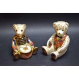 A Royal Crown Derby paperweight Drummer bear; another; a Teddy bear,