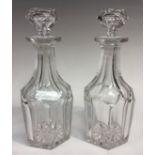 A pair of Victorian panel cut glass mallet decanters and stoppers, 28cm high, c.