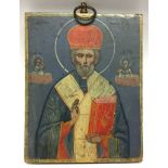 A Russian Orthodox icon, painted with a saint, 11cm X 8.5cm, c.