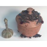 A Turkish terracotta vessel and cover, applied with filigree and coloured glass stones,
