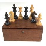 A boxwood and ebonised Staunton pattern chess set,