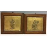 A pair of 18th century giltwood and stucco rectangular panels,