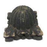 A post-Medieval stone finial, fluted dome above acanthus angles,
