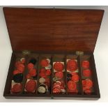 A collection of 18th century and 19th century wax seal impressions,