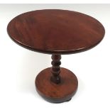 A George IV mahogany miniature pedestal centre table, circular tilting top, turned column,