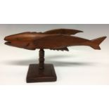 A Pitcairn Island carved fish, stamped Parkin Christian, A Souvenir, Pitcairn Island, turned column,