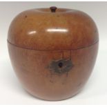 A late 19th century fruitwood novelty tea caddy, as an apple, hinged cover, brass escutcheon,