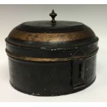 A George III toleware circular spice box, brass finial, gilt banded borders outlined in red,