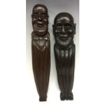 A late 19th century novelty oak figural pilaster, carved with a bald gentleman wearing a bow tie,