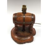 A treen novelty table lamp, as a barrel, turned column, transverse section base, 24cm high,