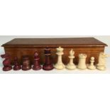 A 19th century bone Staunton pattern chess set, stained opposition, the Kings 6cm high, c.