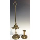 A 19th century brass whale oil spout lamp, axehead handle, knopped stem, circular base,