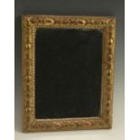 A 19th century giltwood rectangular looking glass,