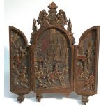 A 19th century French gilt metal triptych altar piece, after a Renaissance design, cast in relief,