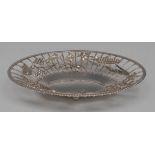 An Edwardian silver oval sweetmeat dish, the wirework border with ears of wheat and fruiting vine,